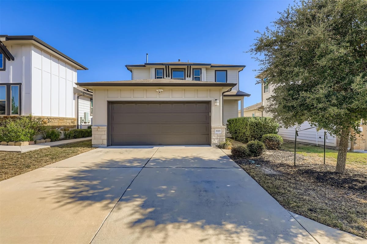 View 15203 Wallaby Way in Village/Wells Branch 15203 Wallaby Way - front exterior - Luxury home in Village/Wells Branch, Austin, TX