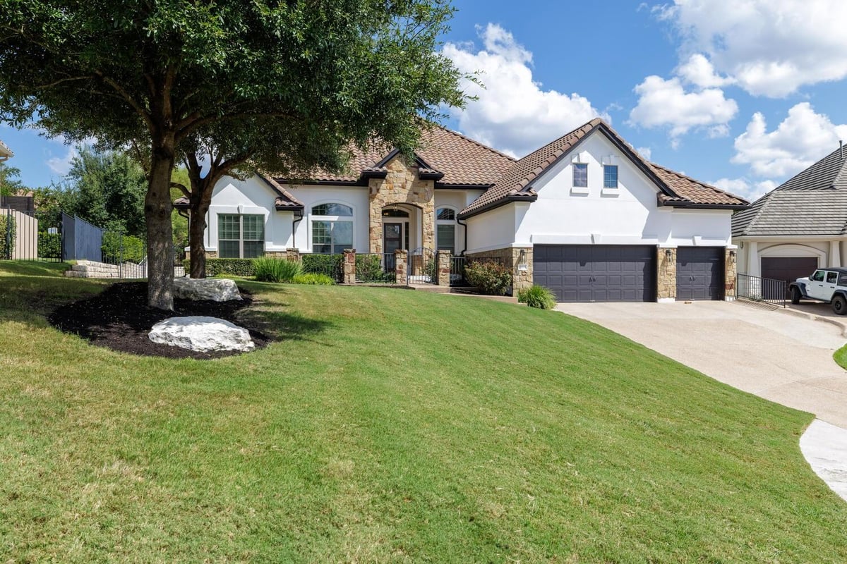 View 15204 SWISS ALPS Ct in Falconhead West Ph 01 & 02 Sec 02 15204 SWISS ALPS Ct - front exterior - Luxury home in Falconhead West Ph 01 & 02 Sec 02, Austin, TX