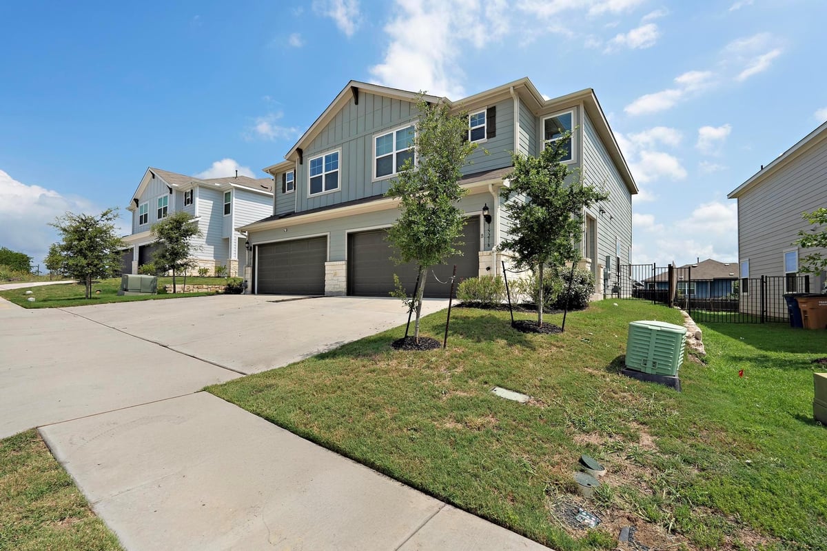 View 15216B Sweet Mimosa DR in Sun Chase 15216B Sweet Mimosa DR - front exterior - Luxury home in Sun Chase, Del Valle, TX