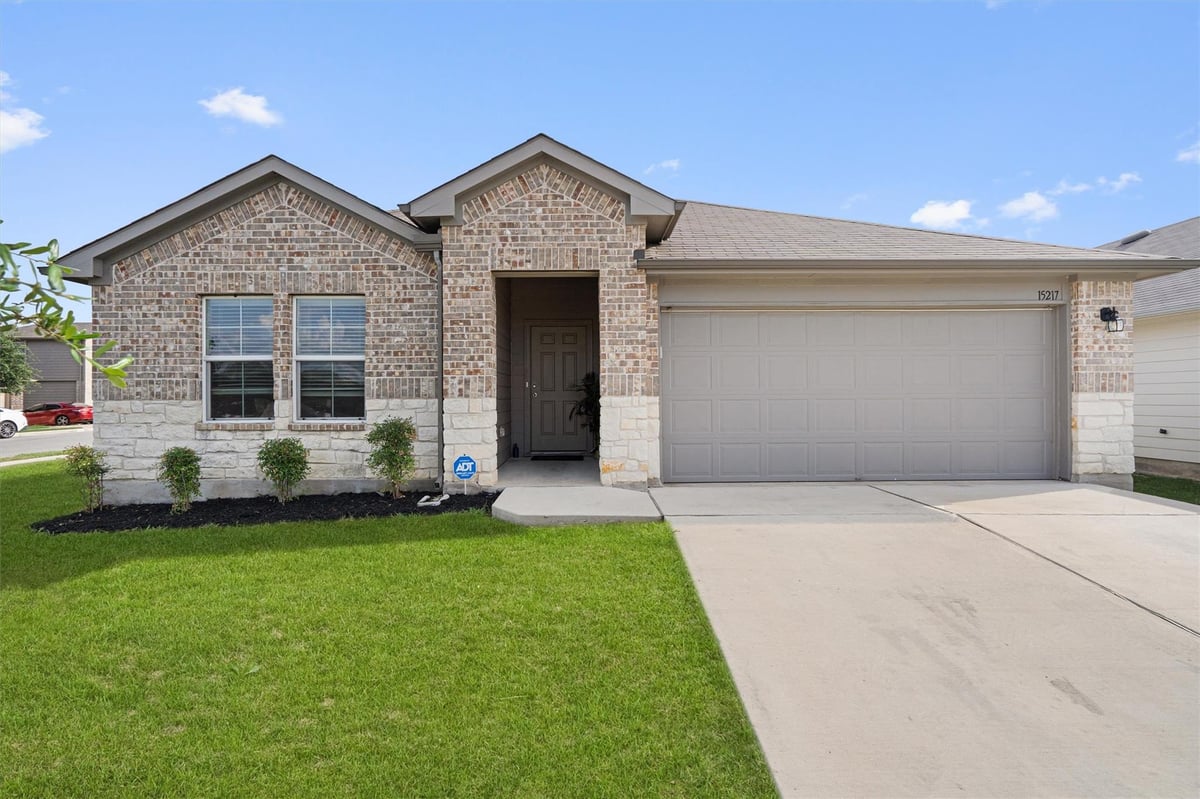 View 15217 Upland Willow RD in Forest Bluff 15217 Upland Willow RD - front exterior - Luxury home in Forest Bluff, Austin, TX