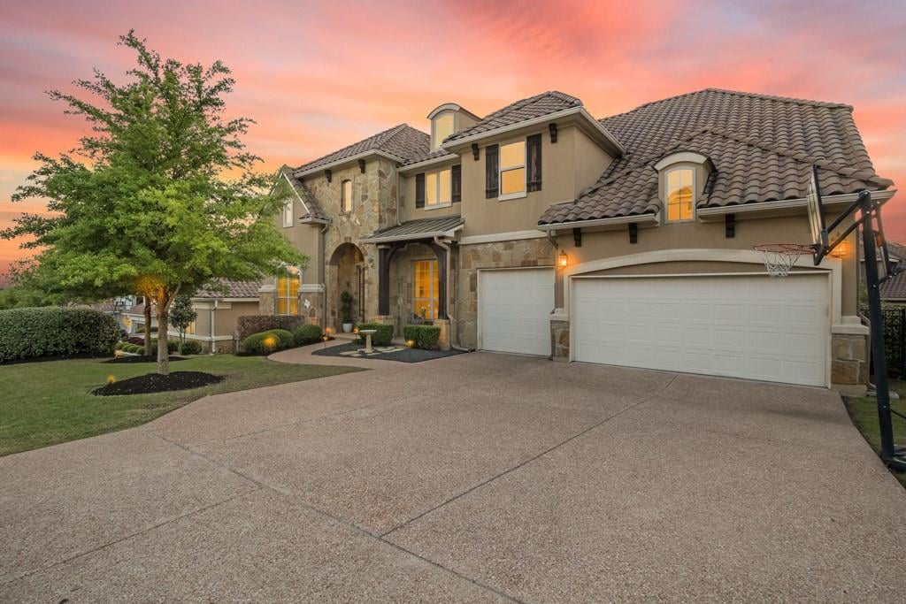 View 15221 Swiss Alps CT in Falconhead West Ph 1 Sec 2 & 15221 Swiss Alps CT - front exterior - Luxury home in Falconhead West Ph 1 Sec 2 &, Austin, TX