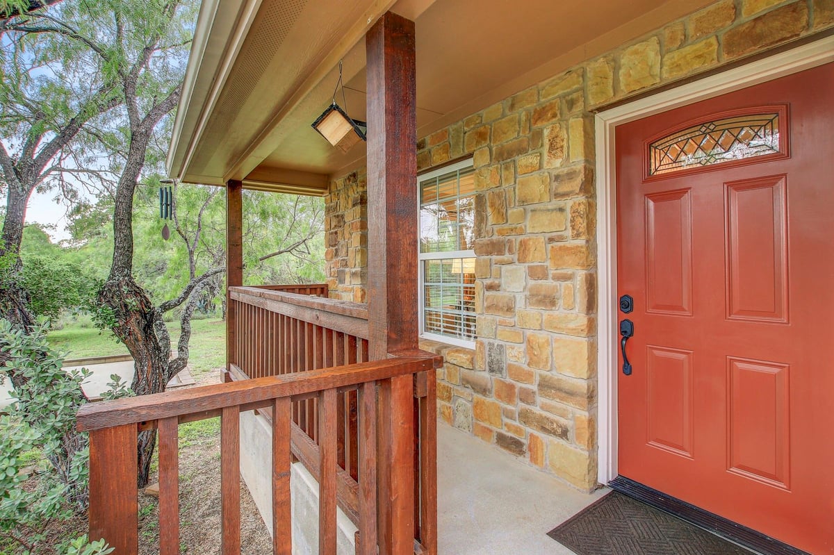 View 153 Hill Dr in Sherwood Heights 153 Hill Dr - front exterior - Luxury home in Sherwood Heights, Marble Falls, TX