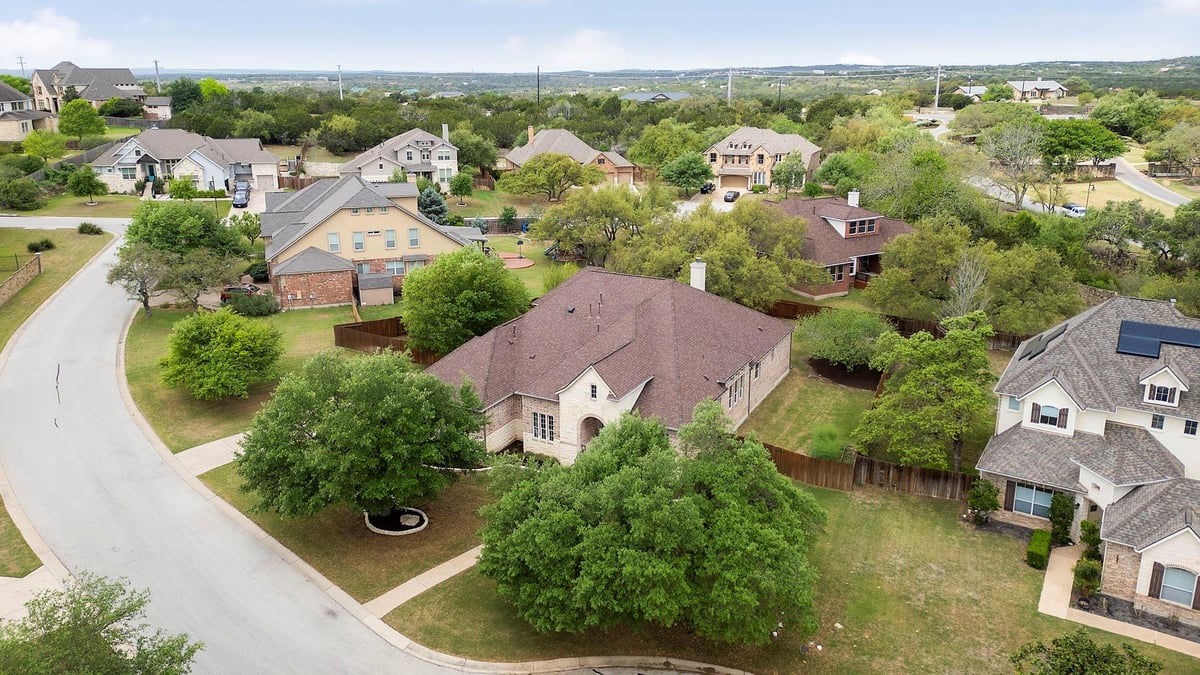 View 153 Mallard Cv in Highpointe Ph I Sec 01 153 Mallard Cv - front exterior - Luxury home in Highpointe Ph I Sec 01, Austin, TX