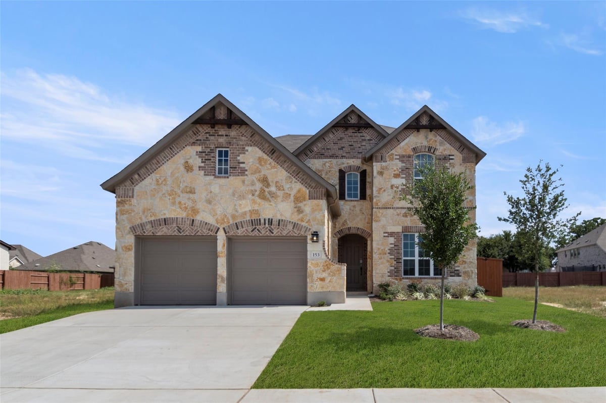 View 153 Rocky River Rd in Oaks at San Gabriel 153 Rocky River Rd - front exterior - Luxury home in Oaks at San Gabriel, Georgetown, TX