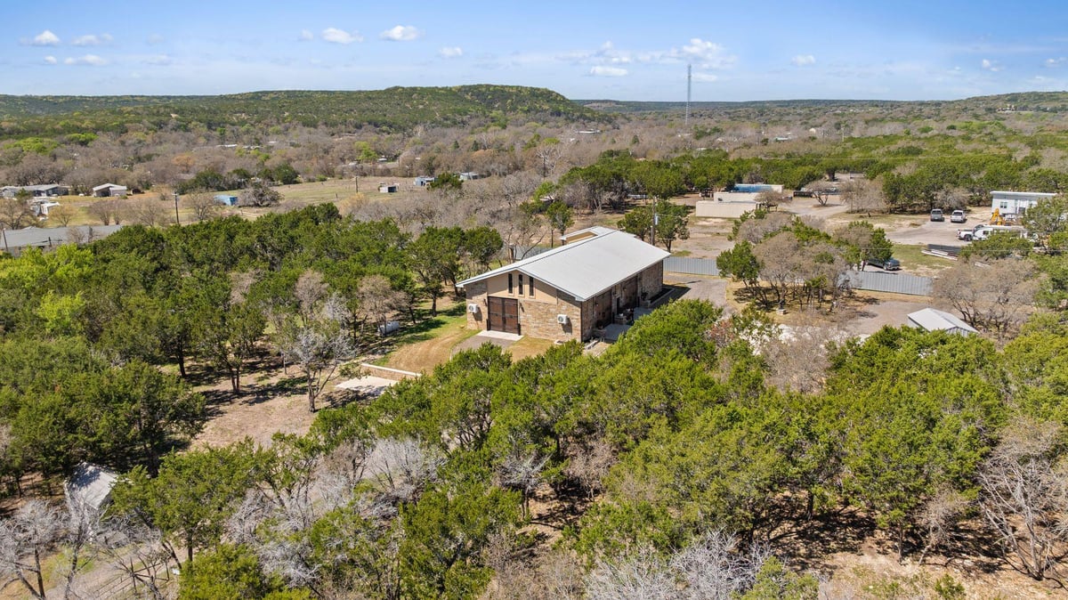 View 15303 Faubion Trl in Roundmountain Oaks Revision Of 15303 Faubion Trl - front exterior - Luxury home in Roundmountain Oaks Revision Of, Leander, TX