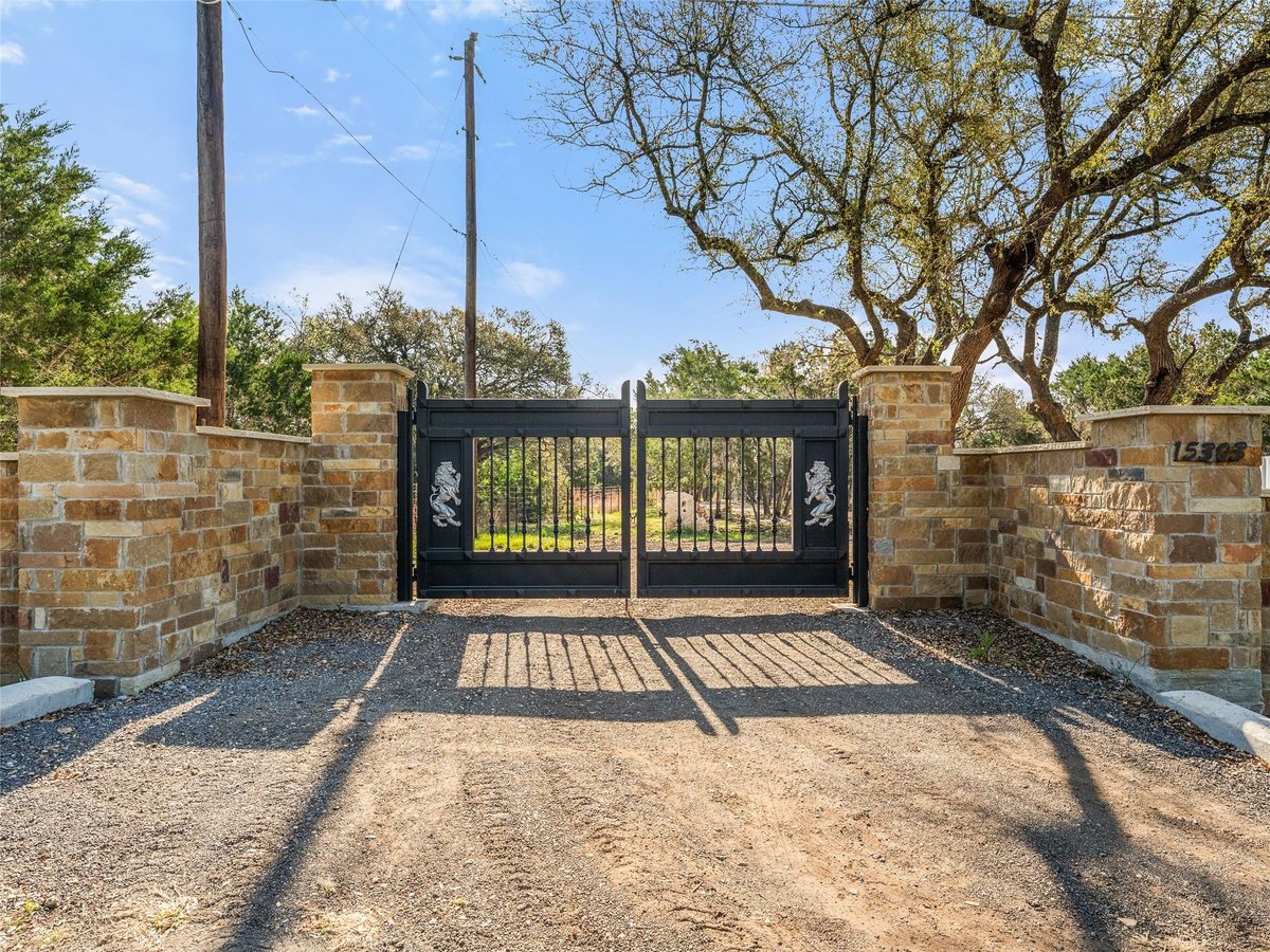 View 15303 Faubion TRL in Roundmountain Oaks Revision Of 15303 Faubion TRL - front exterior - Luxury home in Roundmountain Oaks Revision Of, Leander, TX