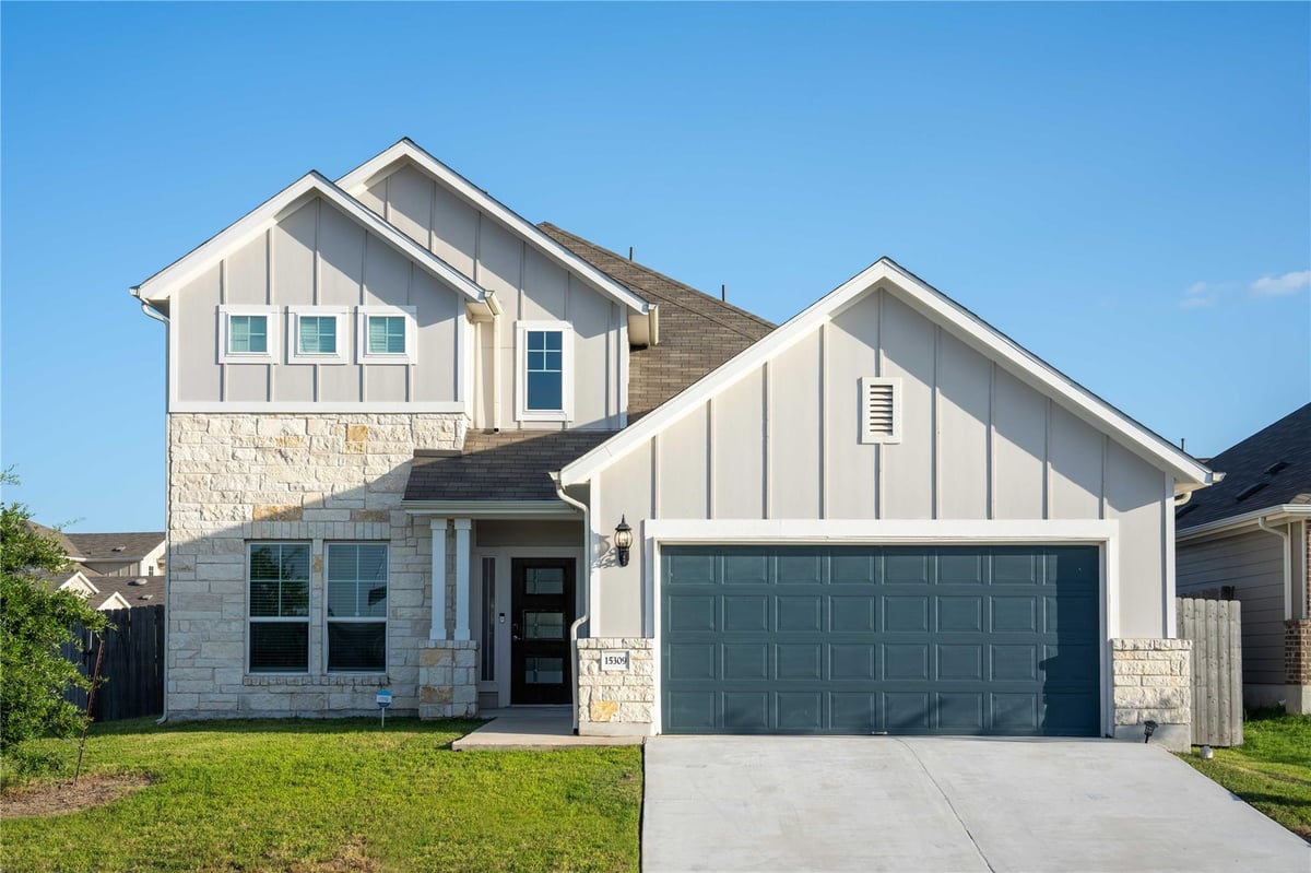 View 15309 Grenadine Bloom CV in Sun Chase 15309 Grenadine Bloom CV - front exterior - Luxury home in Sun Chase, Del Valle, TX