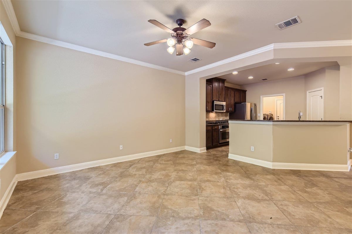Living area at 15315 Origins Ln - 3 bed 2 bath home