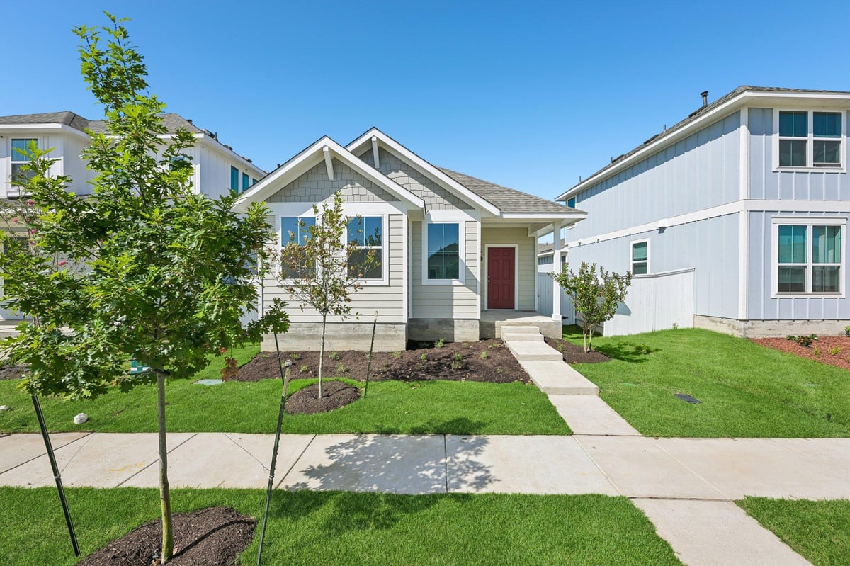 View 154 Daylily DR in Harvest Ridge 154 Daylily DR - front exterior - Luxury home in Harvest Ridge, Elgin, TX