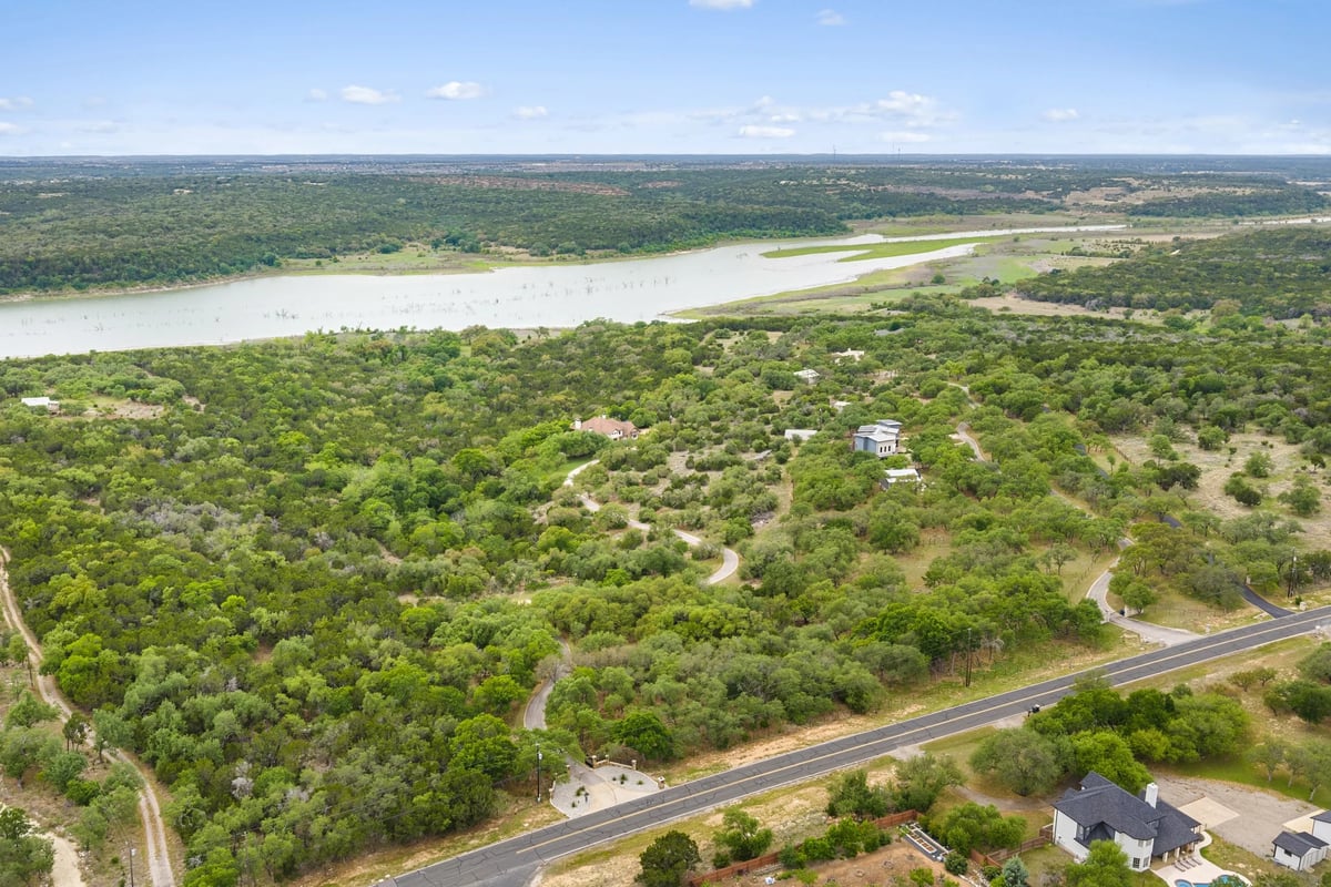 Aerial view along County Road 262 showing Lake Georgetown and the wooded grounds