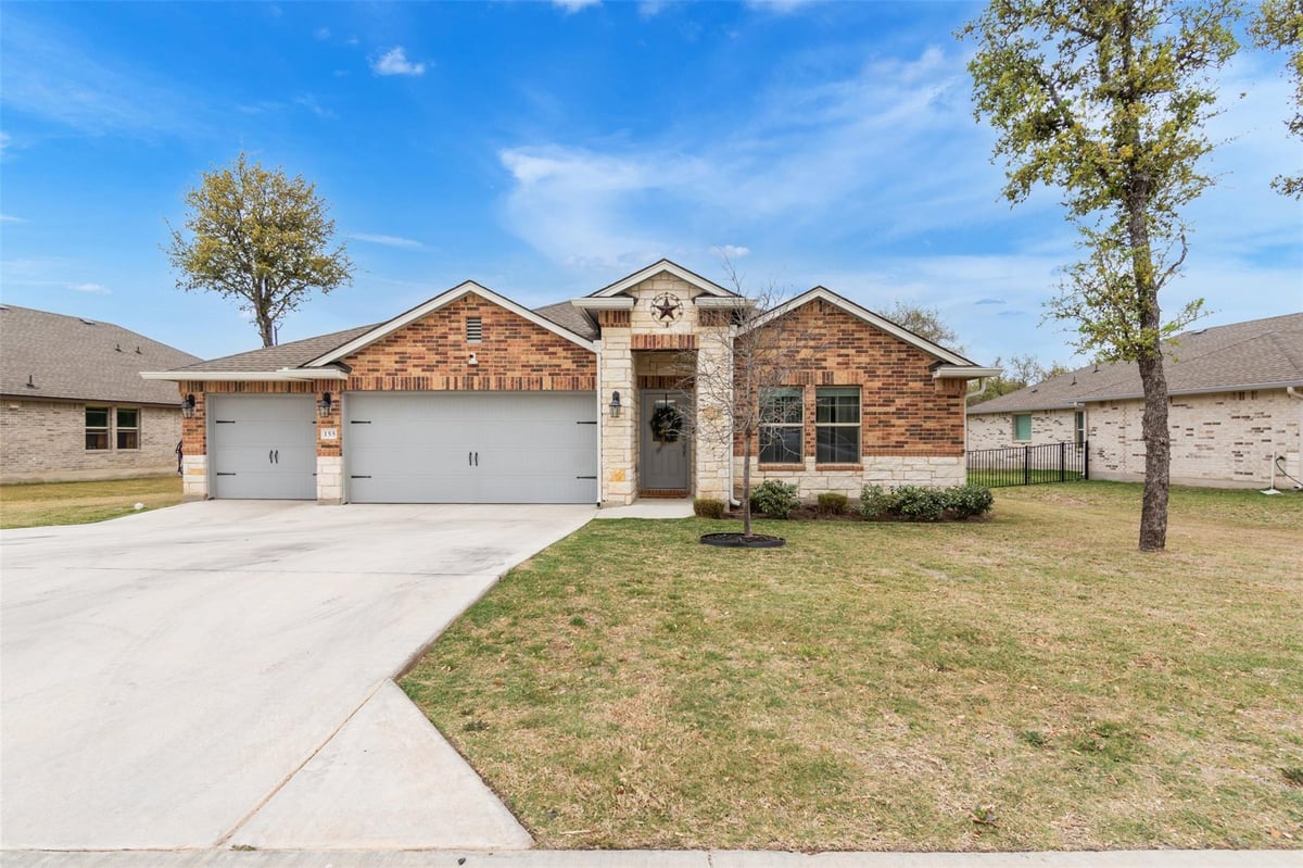 View 155 Tom Kite Dr in Delaware Springs 155 Tom Kite Dr - front exterior - Luxury home in Delaware Springs, Burnet, TX