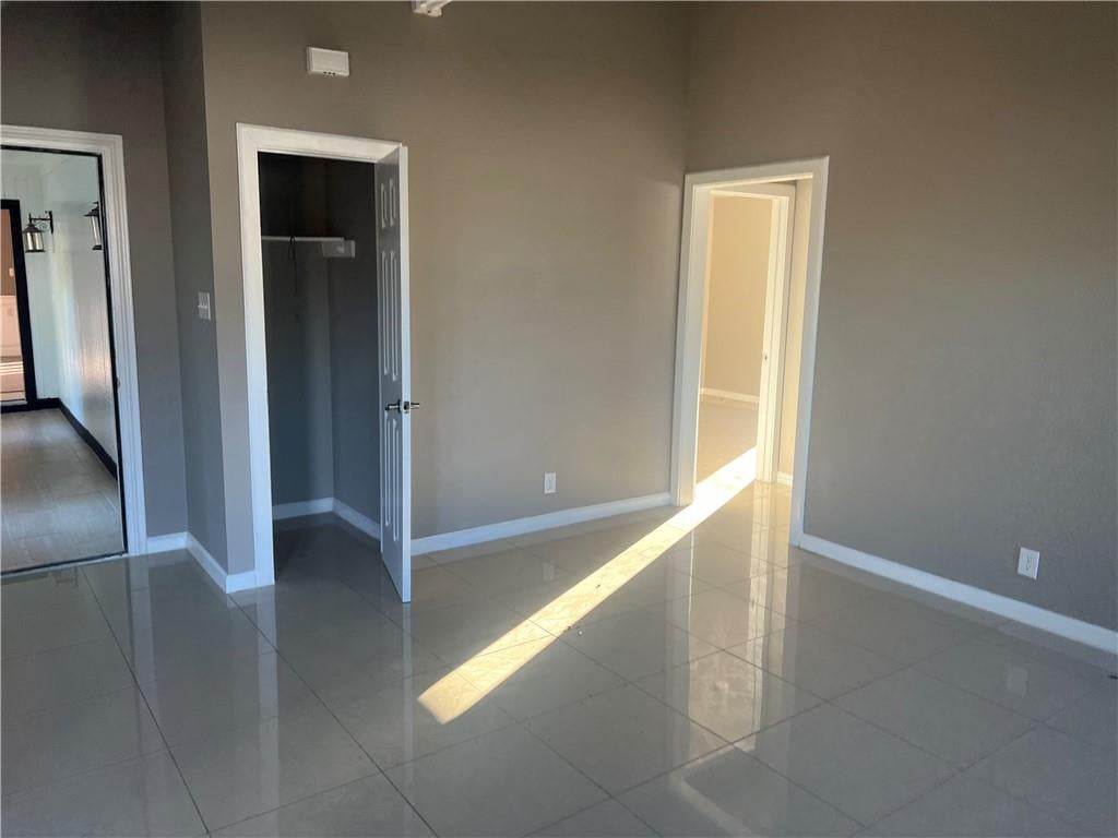 Primary bedroom at 15504 Spring Hill Ln - Spring Hill Village, Pflugerville, TX