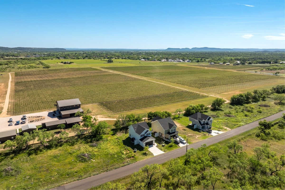 View 1557 County Road 119 in ENCHANTED VILLAGE 1557 County Road 119 - front exterior - Luxury home in ENCHANTED VILLAGE, Burnet, TX