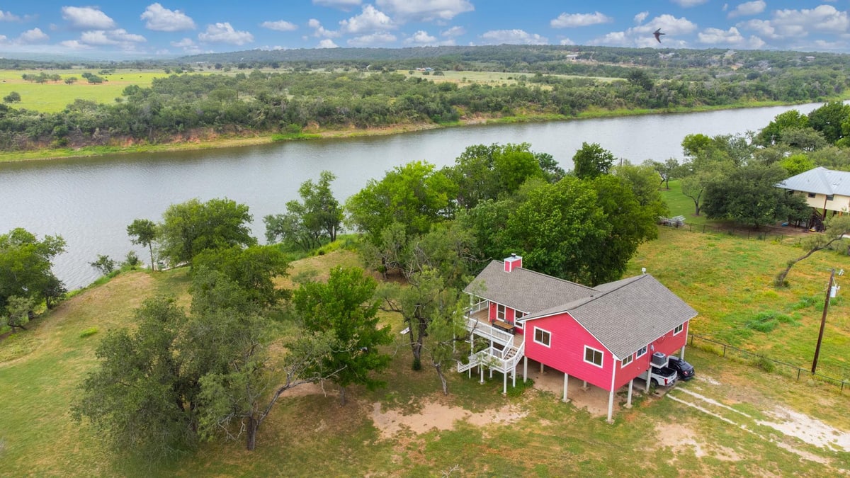 View 1559 County Road 343 in Jackson Bottom 1559 County Road 343 - front exterior - Luxury home in Jackson Bottom, Marble Falls, TX