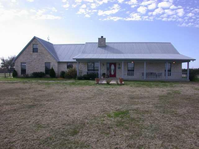 View 156 Zimmerhanzel RD 156 Zimmerhanzel RD - front exterior - Luxury home in Flatonia, TX