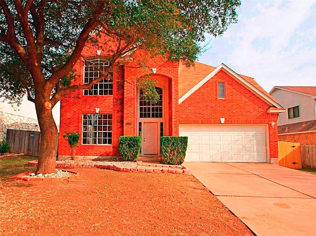 View 15613 Poynette Pl in Woods Brushy Creek Sec 03 15613 Poynette Pl - front exterior - Luxury home in Woods Brushy Creek Sec 03, Austin, TX