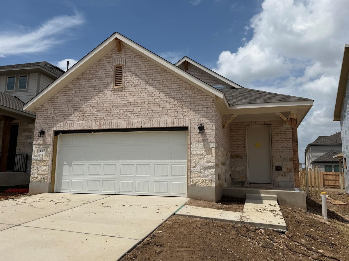 View 157 Clover BND in Lariat 157 Clover BND - front exterior - Luxury home in Lariat, Liberty Hill, TX