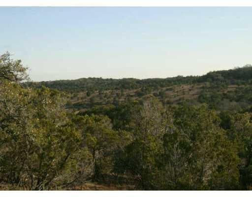 View 1570 D Caliche RD 1570 D Caliche RD - front exterior - Luxury home in Wimberley, TX