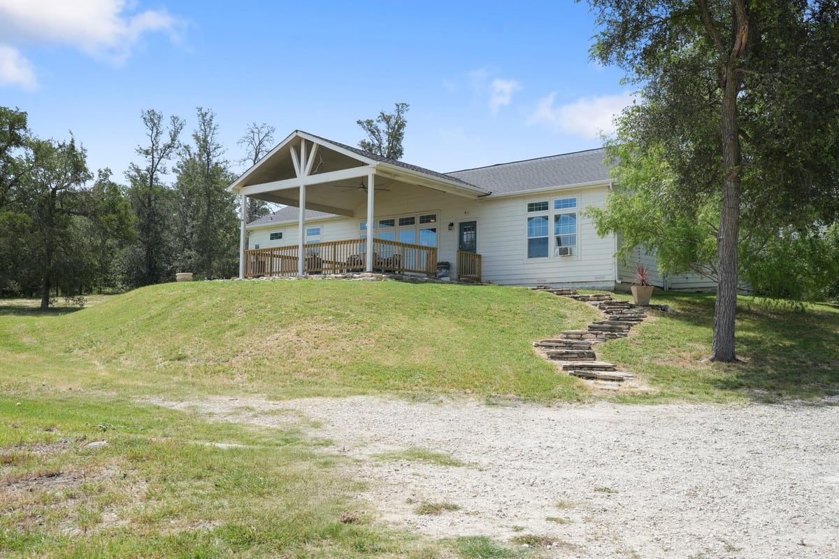 15701 Forest Glen CV - property photo 1 - Luxury home in Timber Hills, Del Valle, TX
