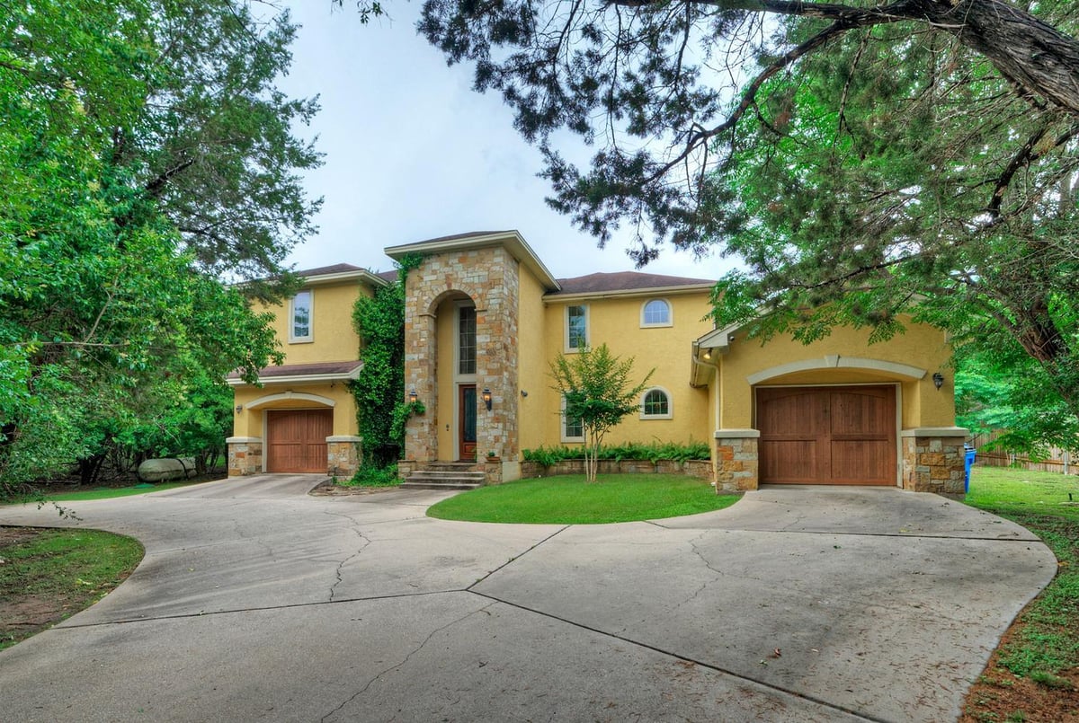 View 15705 Wildwood TRL in Lakeland Hills Sec 02 15705 Wildwood TRL - front exterior - Luxury home in Lakeland Hills Sec 02, Austin, TX