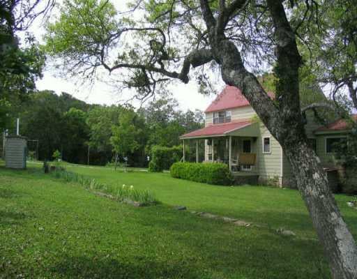 View 15717 Fitzhugh Rd/ Bonham R 15717 Fitzhugh Rd/ Bonham R - front exterior - Luxury home in Dripping Springs, TX