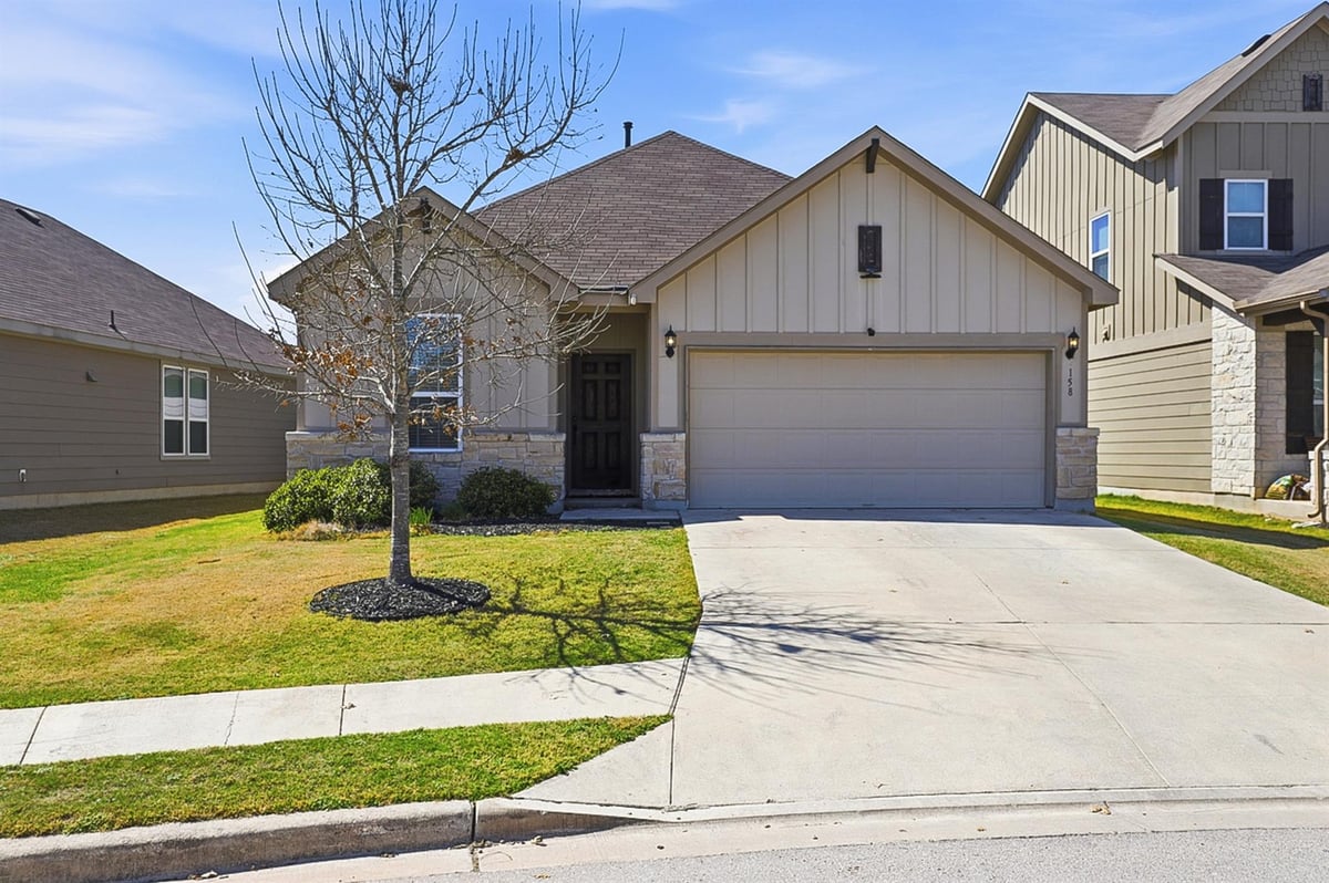 View 158 Fern DR in Sunfield Ph Two Sec Six 158 Fern DR - front exterior - Luxury home in Sunfield Ph Two Sec Six, Buda, TX