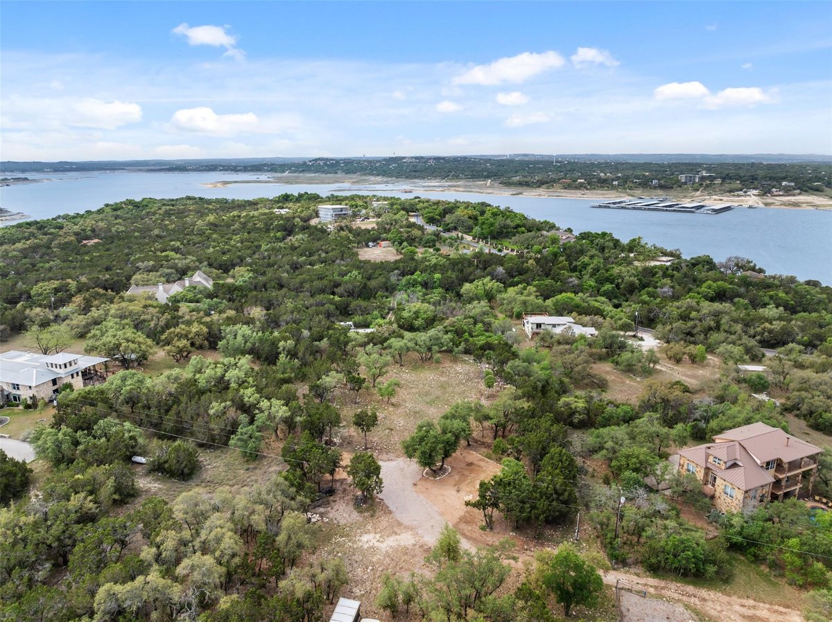 View 15901 Buddy Ave in Lake Travis 03 15901 Buddy Ave - front exterior - Luxury lot in Lake Travis 03, Volente, TX