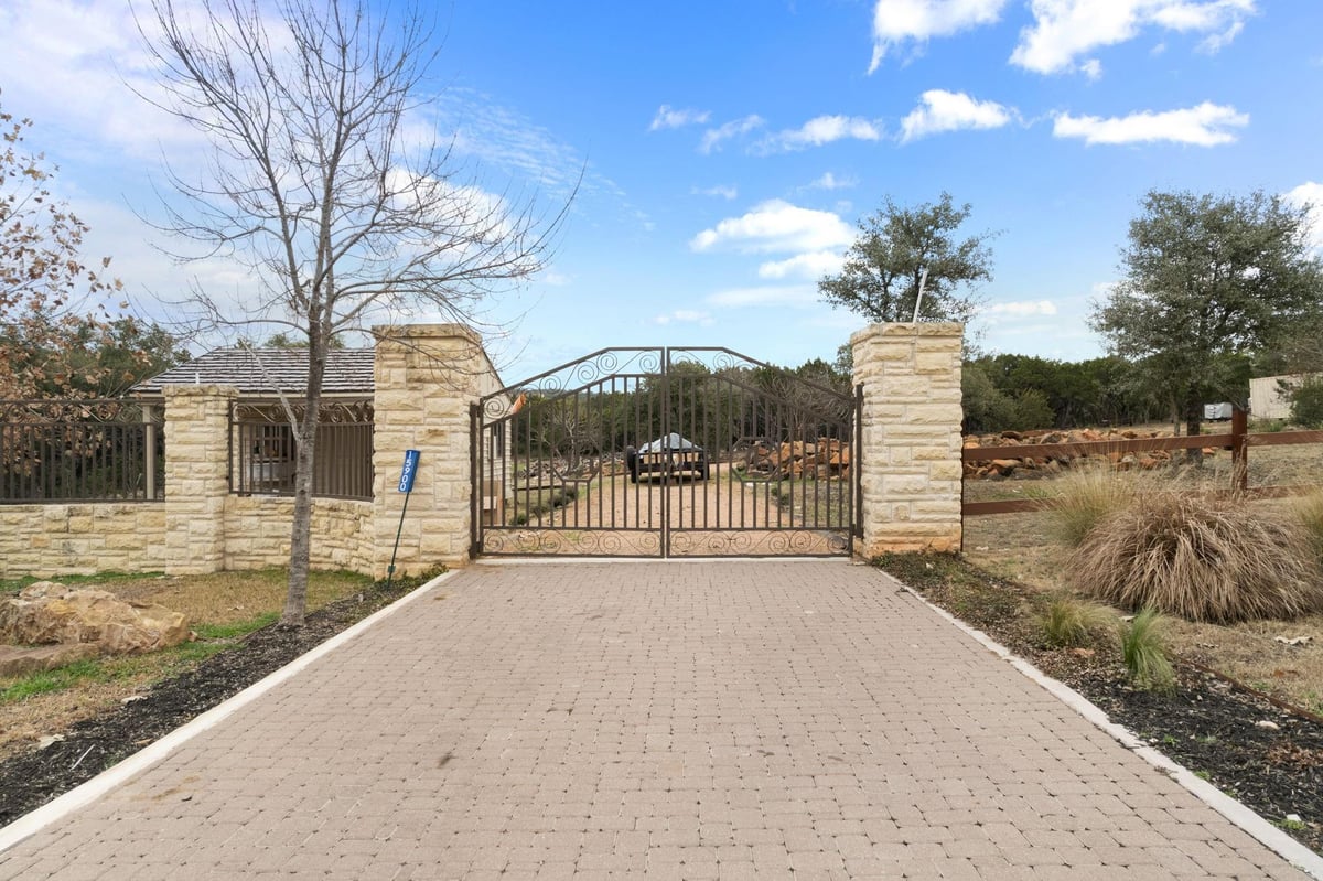 View 15902 Booth Cir in Branson Wood 15902 Booth Cir - front exterior - Luxury lot in Branson Wood, Volente, TX