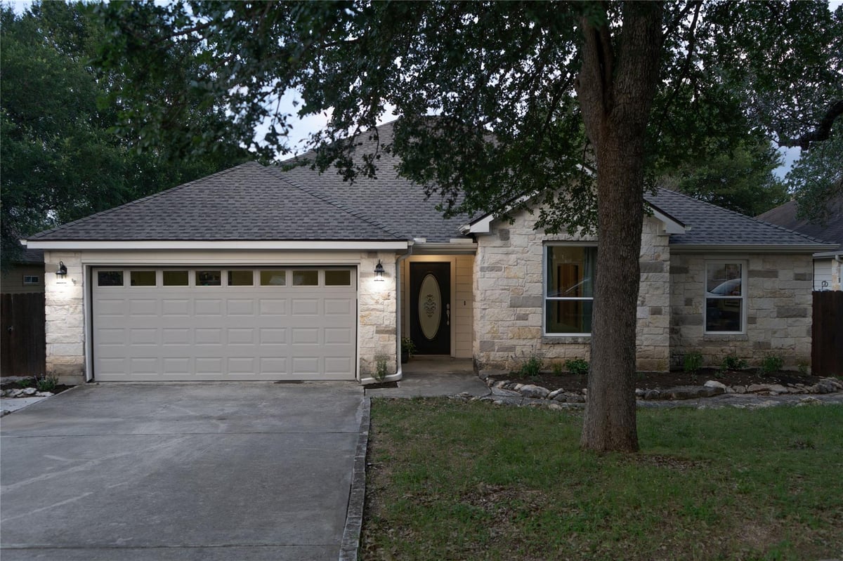 View 16 Serenade CIR in Woodcreek Sec 19 16 Serenade CIR - front exterior - Luxury home in Woodcreek Sec 19, Wimberley, TX