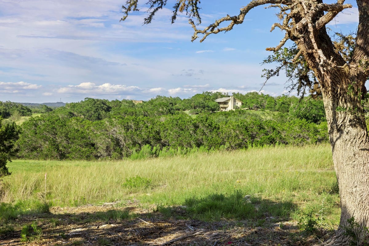 View 16 Shanandoah Cir in Woodcreek Sec 16 16 Shanandoah Cir - front exterior - Luxury lot in Woodcreek Sec 16, Wimberley, TX