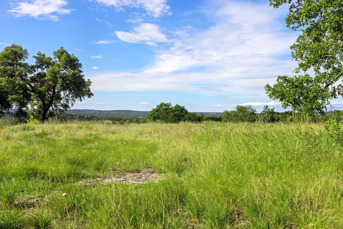 Primary bedroom at 16 Shanandoah Cir - Woodcreek Sec 16, Wimberley, TX