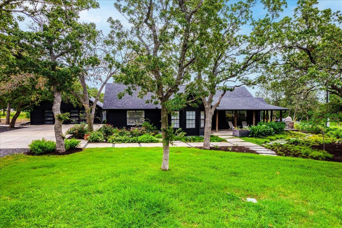 View 160 Shady Oaks DR in Shady Oaks 160 Shady Oaks DR - front exterior - Luxury home in Shady Oaks, Dale, TX