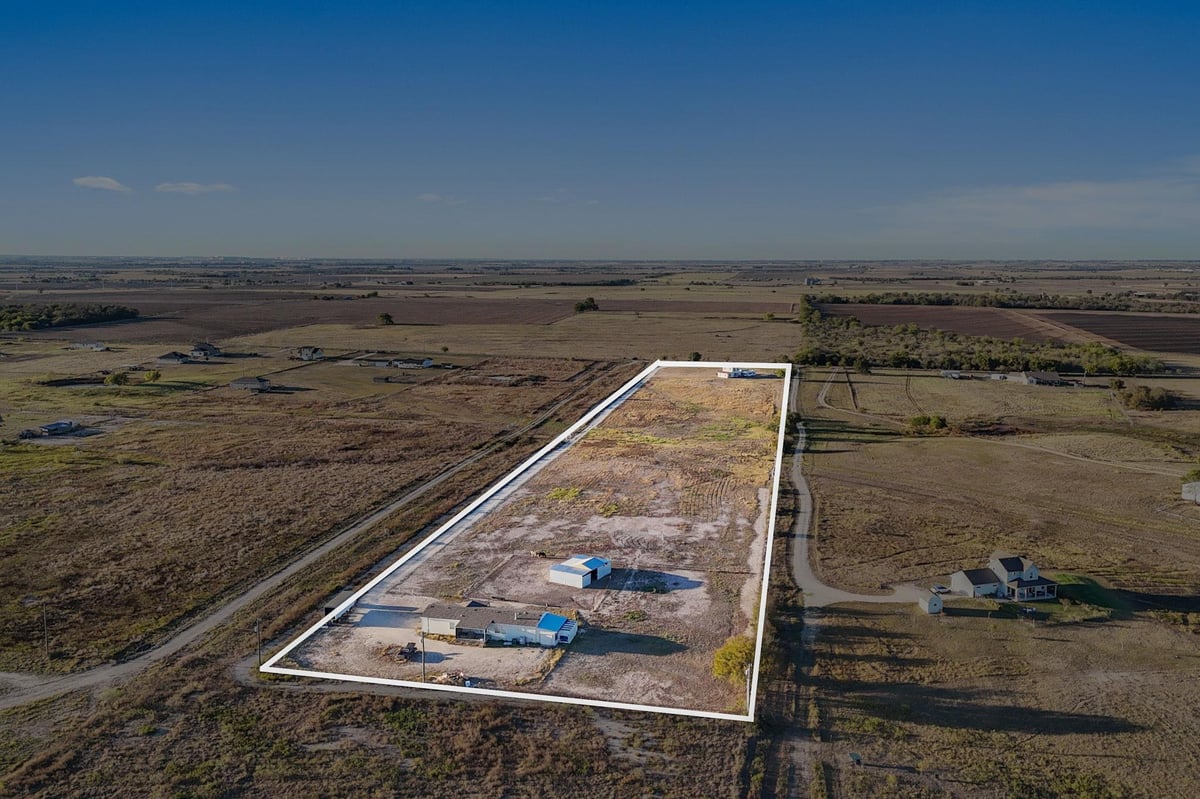 View 1600 County Road 465 1600 County Road 465 - front exterior - Luxury home in Elgin, TX