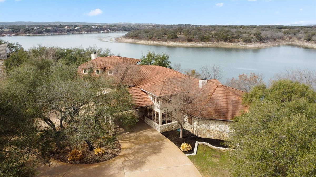 View 1600 Las Entradas Dr in Las Entradas On Lake Travis 1600 Las Entradas Dr - front exterior - Luxury home in Las Entradas On Lake Travis, Spicewood, TX