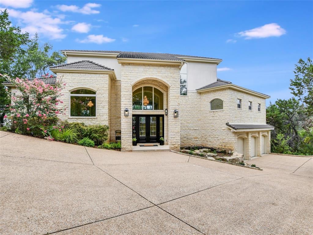 View 16008 Canard Cir in Vineyard Bay Ph 01 16008 Canard Cir - front exterior - Luxury home in Vineyard Bay Ph 01, Austin, TX
