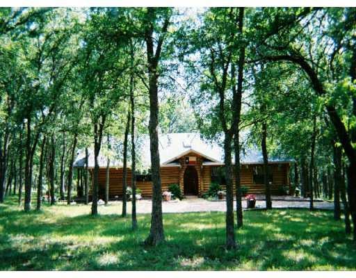 View 16029 Decker Lake RD 16029 Decker Lake RD - property photo 1 - Luxury home in Manor, TX