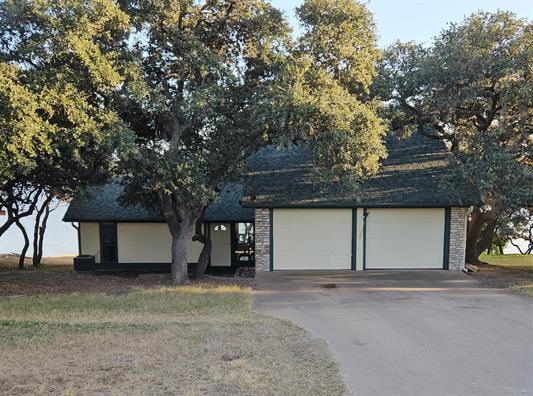 View 1604 County Road 128 in Silver Creek Village 1604 County Road 128 - front exterior - Luxury home in Silver Creek Village, Burnet, TX