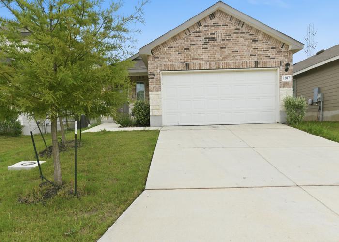 View 1607 Champagne Oak in Winding Crk Ranch Un 1 1607 Champagne Oak - front exterior - Luxury home in Winding Crk Ranch Un 1, New Braunfels, TX