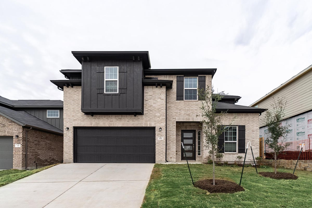 View 161 Mango Cir in Sunfield 161 Mango Cir - front exterior - Luxury home in Sunfield, Buda, TX