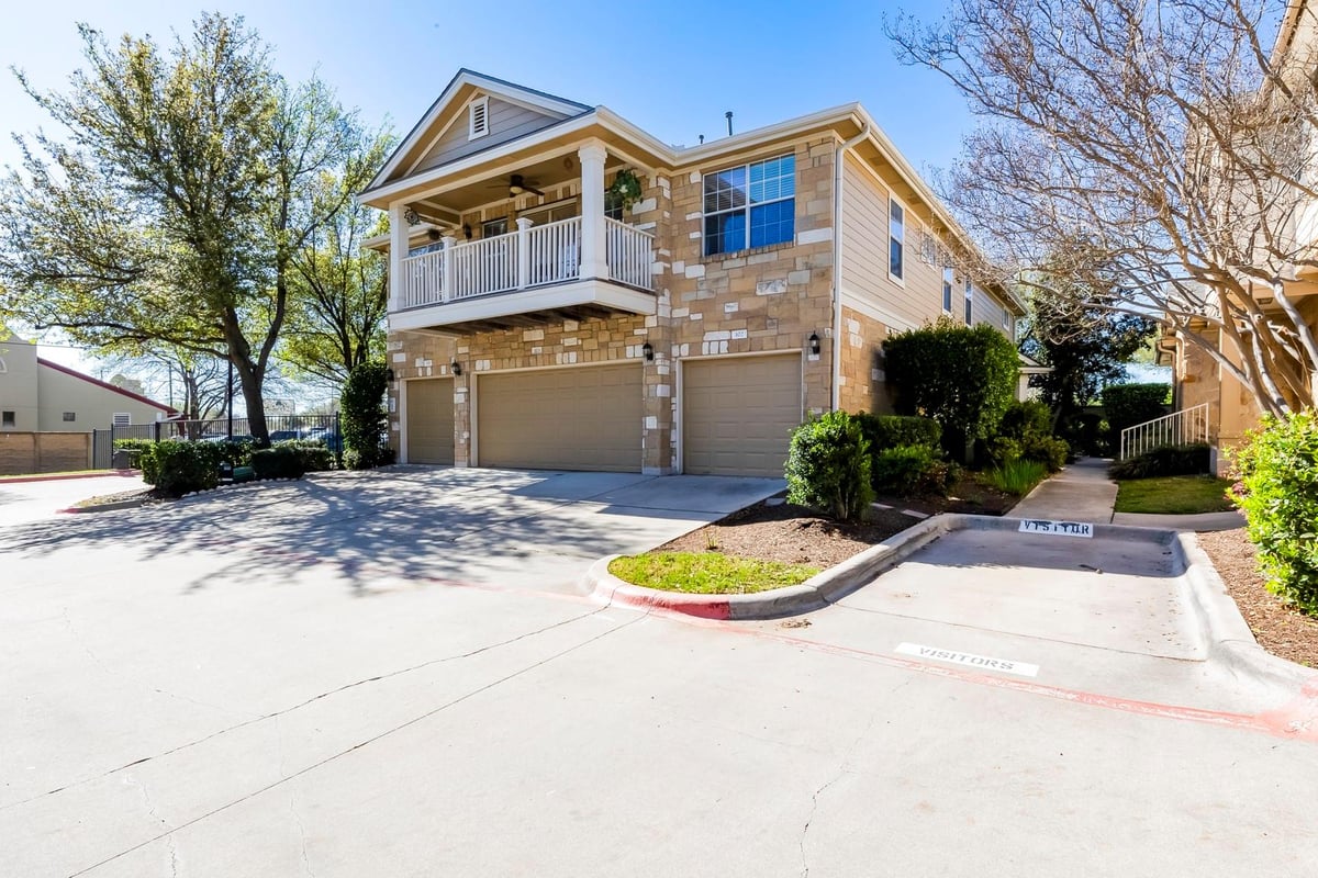 View 16100 S Great Oaks Dr Unit #102 in Cat Hollow Condo 16100 S Great Oaks Dr Unit #102 - front exterior - Luxury home in Cat Hollow Condo, Round Rock, TX