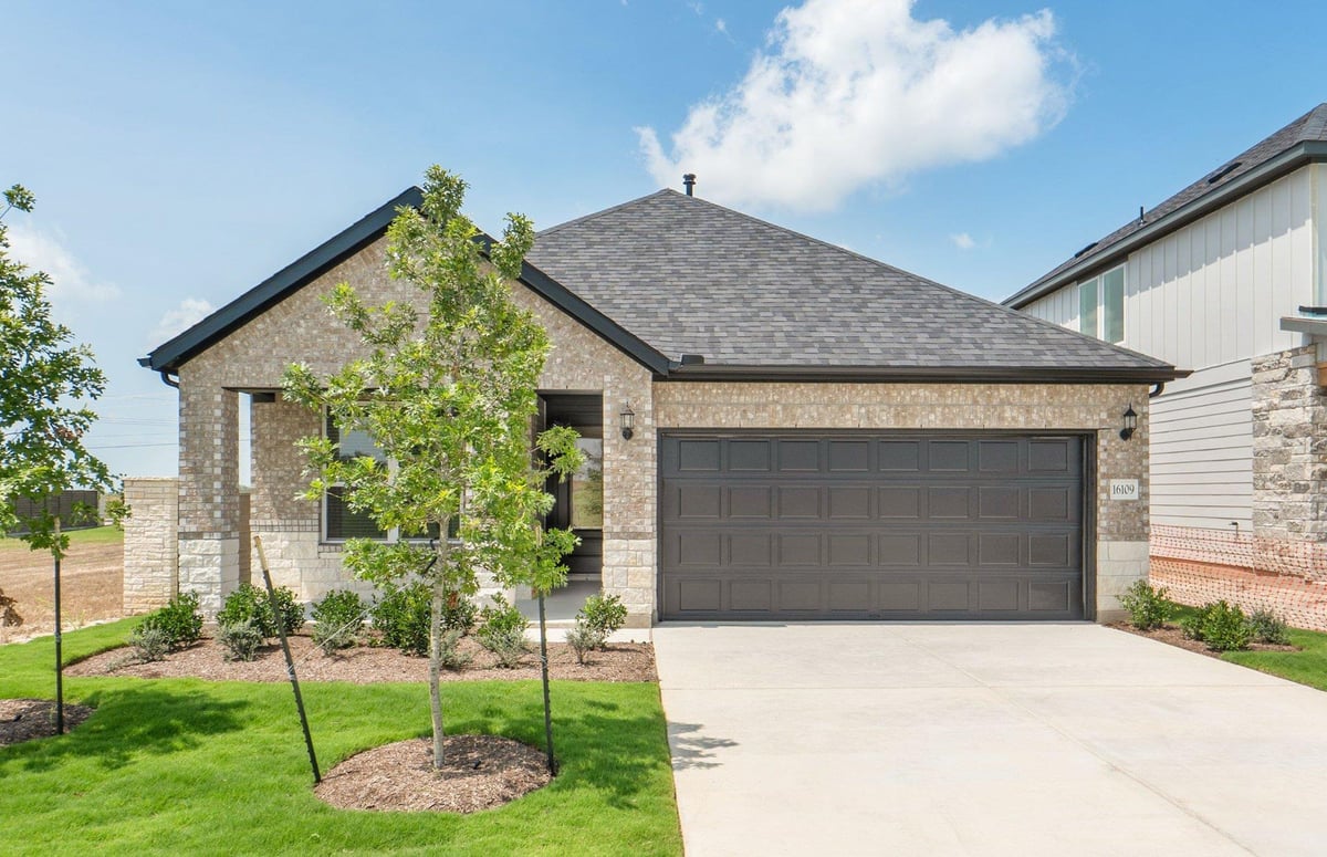 View 16109 Emma Edge LN in Kuempel Farms 16109 Emma Edge LN - front exterior - Luxury home in Kuempel Farms, Pflugerville, TX