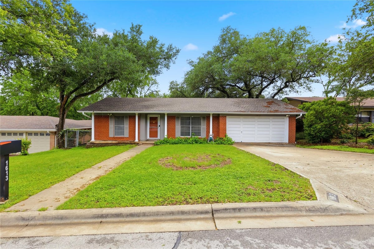 View 1613 Sunnyvale ST in River Oaks Sec 01 1613 Sunnyvale ST - property photo 1 - Luxury home in River Oaks Sec 01, Austin, TX