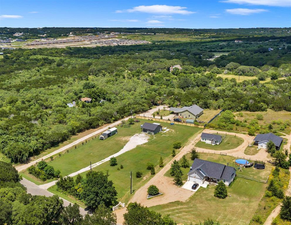 View 1619 County Road 340 in Morman Mill Mdws 1619 County Road 340 - front exterior - Luxury home in Morman Mill Mdws, Burnet, TX