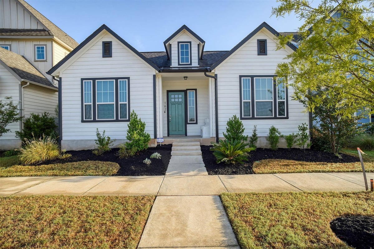 View 162 Adelton Blvd in West Bastrop Village Ph 1 Sec 1 162 Adelton Blvd - front exterior - Luxury home in West Bastrop Village Ph 1 Sec 1, Bastrop, TX