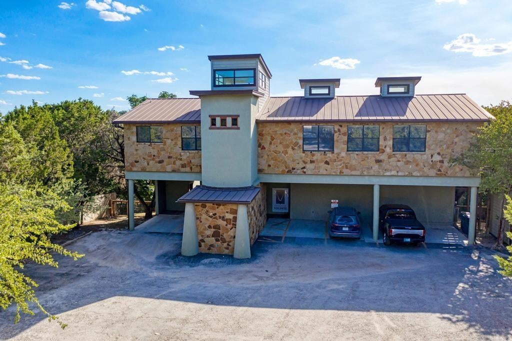 View 16201 Dodd St in Lake Travis 01 16201 Dodd St - front exterior - Luxury home in Lake Travis 01, Volente, TX