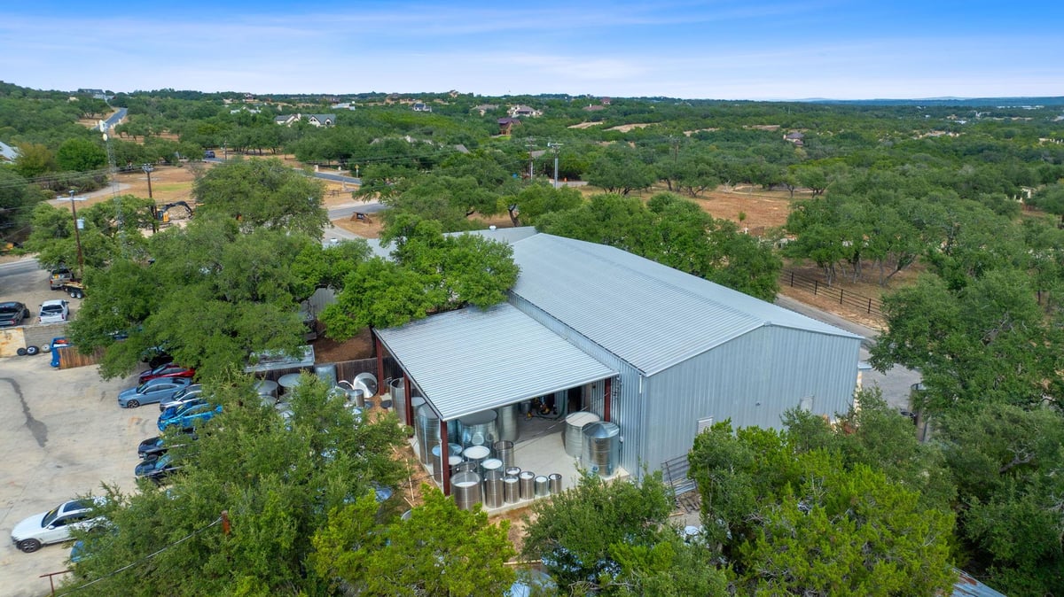 Primary bedroom at 16299 Fitzhugh Rd Unit #E - Silver Creek Bus Park, Dripping Springs, TX