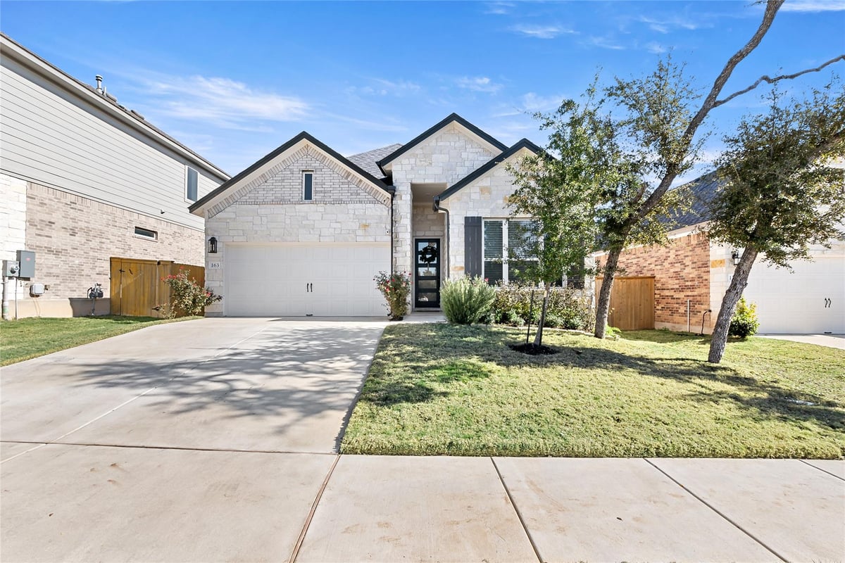 View 163 Cotton Tree Ter in Heritage Dripping Spgs Ph1 163 Cotton Tree Ter - front exterior - Luxury home in Heritage Dripping Spgs Ph1, Dripping Springs, TX