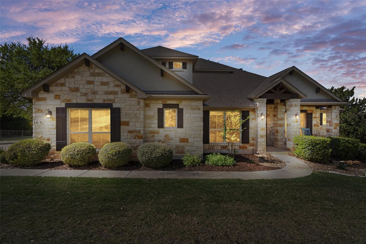 View 164 Milestone Rd in Estates at Stonewall Ranch 164 Milestone Rd - front exterior - Luxury home in Estates at Stonewall Ranch, Liberty Hill, TX