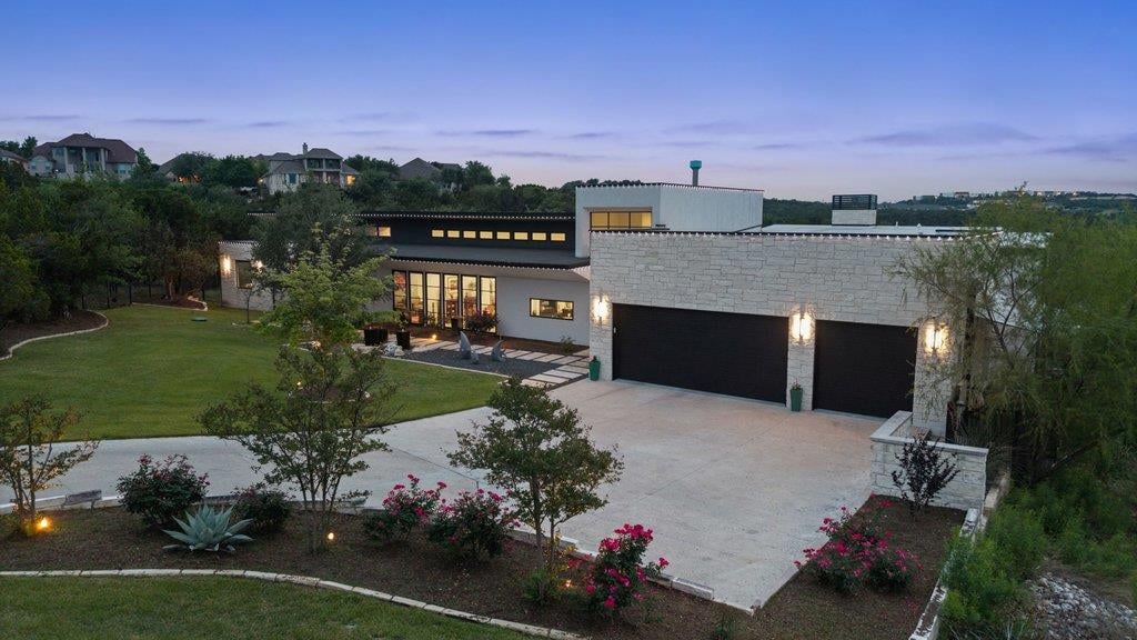 View 16409 Shane Landon Ct in Hennig Heights 01 16409 Shane Landon Ct - front exterior with contemporary rear exterior - Luxury home in Hennig Heights 01, Austin, TX
