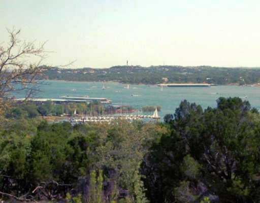View 16416 Sherman St 16416 Sherman St - property photo 1 - Luxury lot in Volente, TX